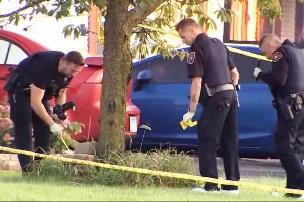 Police officers investigate the scene in Romeoville, Ill., on Sept. 18, 2023. (NBC Chicago)